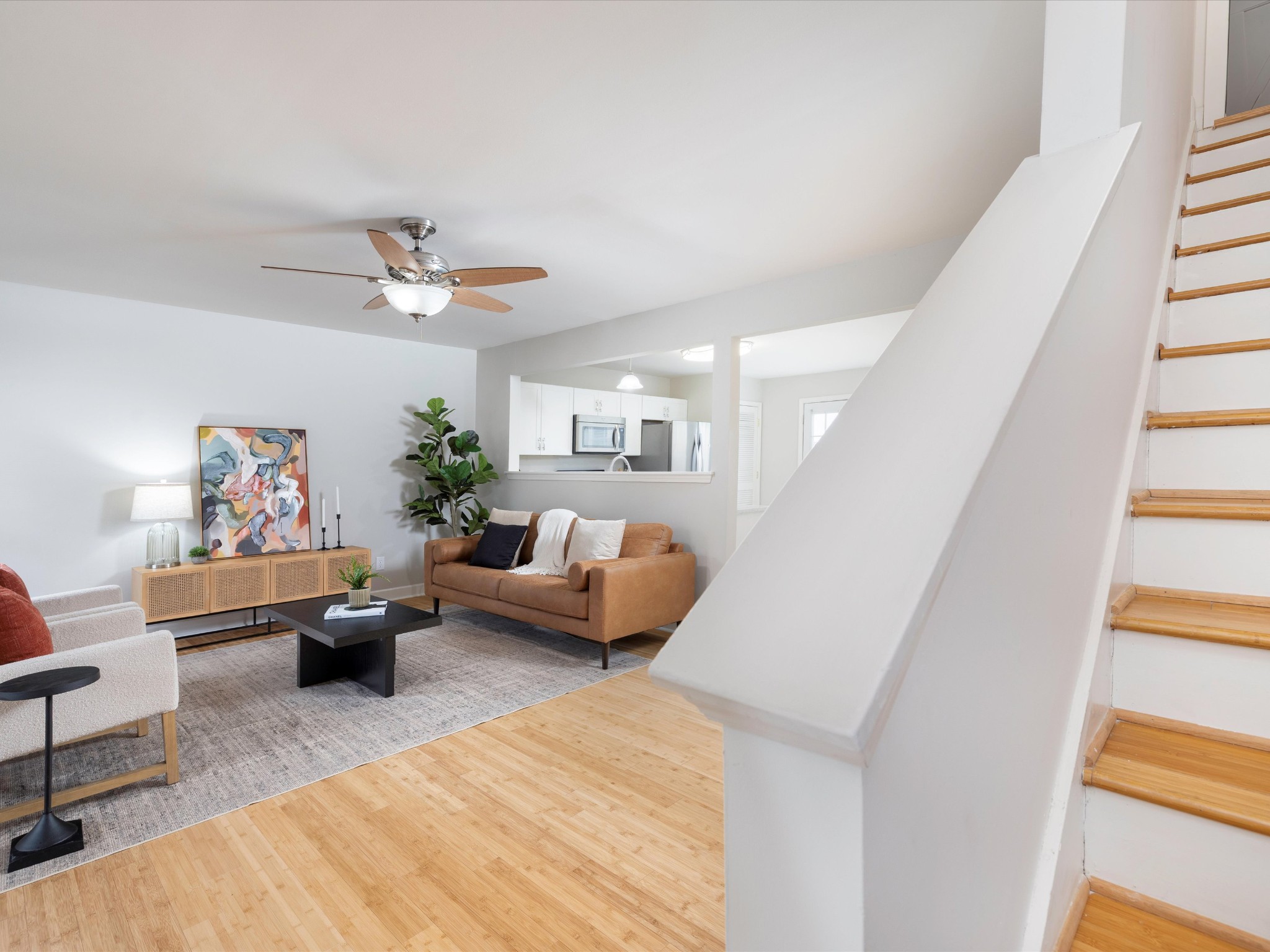 1007 Persimmon Drive Spring Hill, TN 37174 - Photo 23 of 44 a living room with furniture and a chandelier