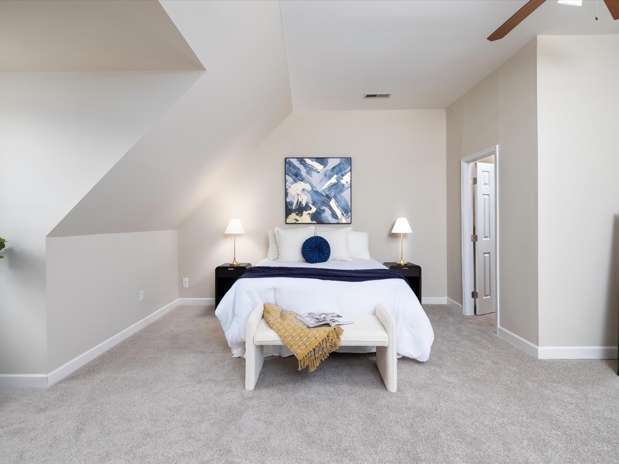 1007 Persimmon Drive Spring Hill, TN 37174 - Photo 27 of 44 a bed sitting in a bedroom next to a window