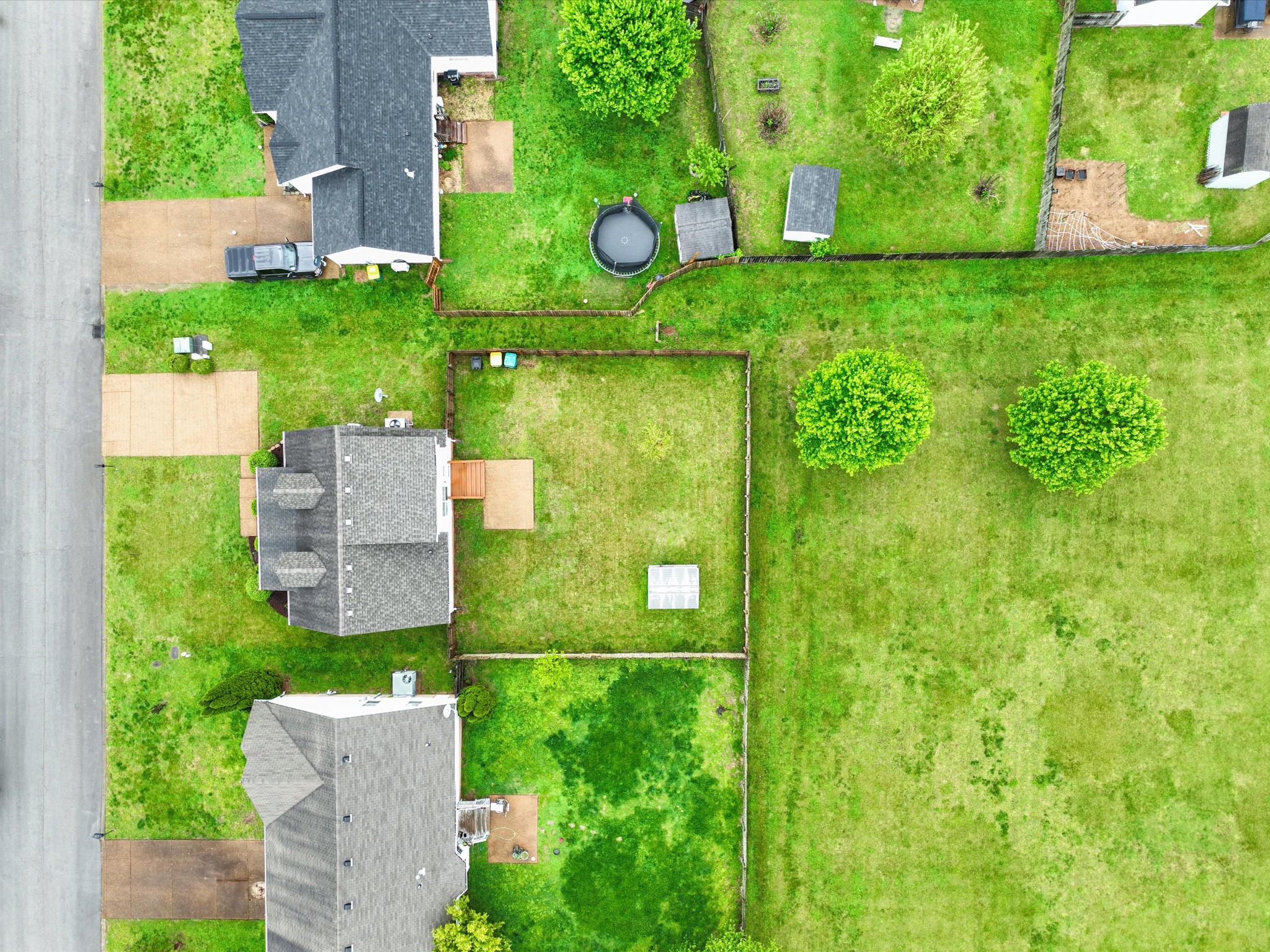 1007 Persimmon Drive Spring Hill, TN 37174 - Photo 40 of 44 a view of a garden from a building