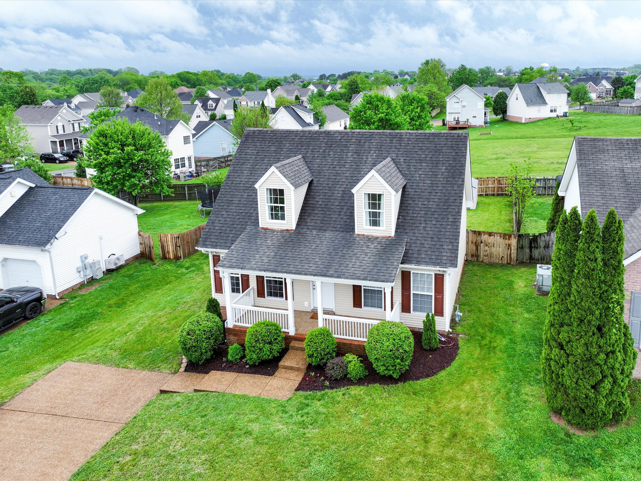 1007 Persimmon Drive Spring Hill, TN 37174 - Photo 41 of 44 front view of a house with a yard