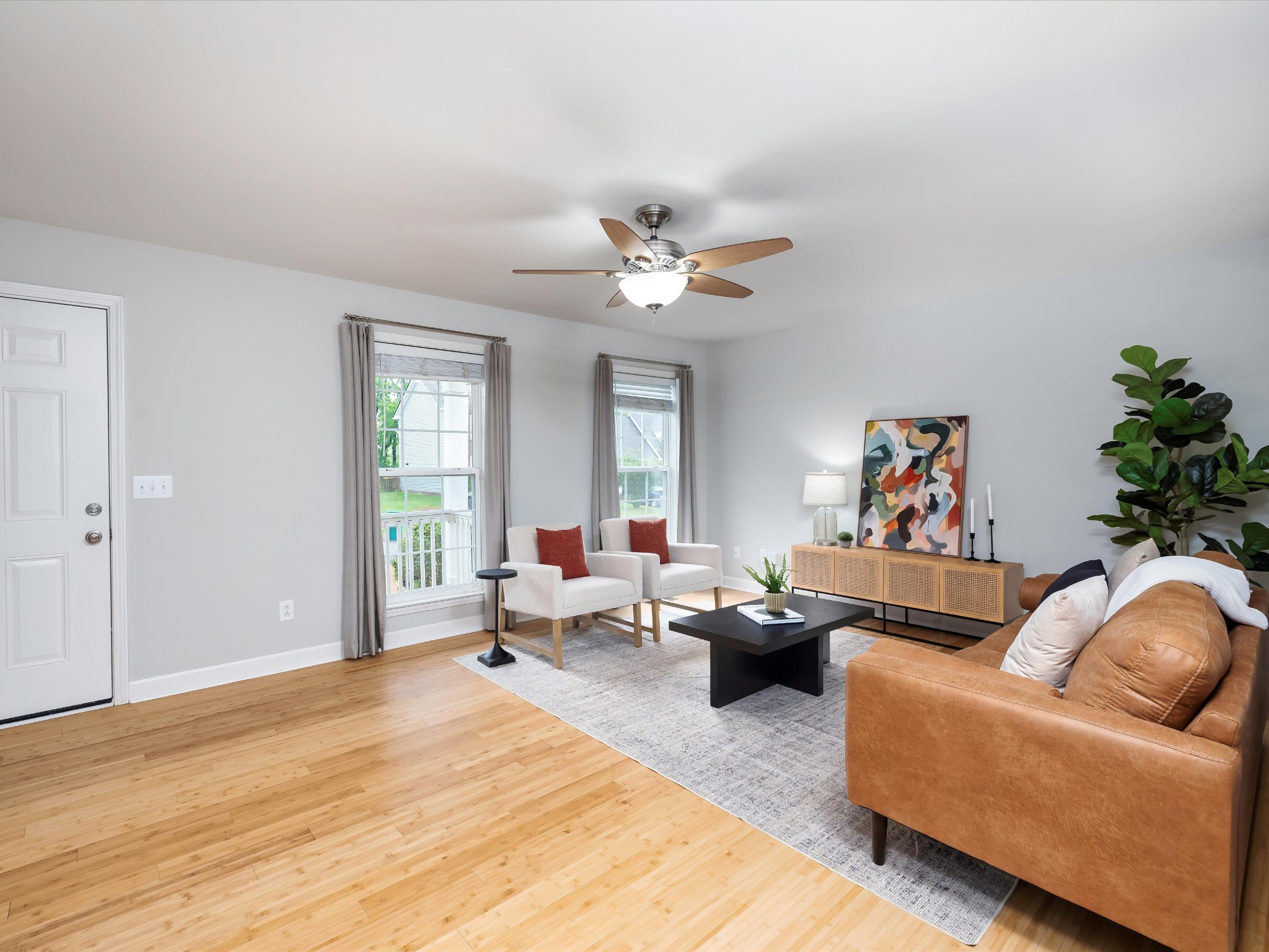1007 Persimmon Drive Spring Hill, TN 37174 - Photo 7 of 44 a living room with furniture and a large window