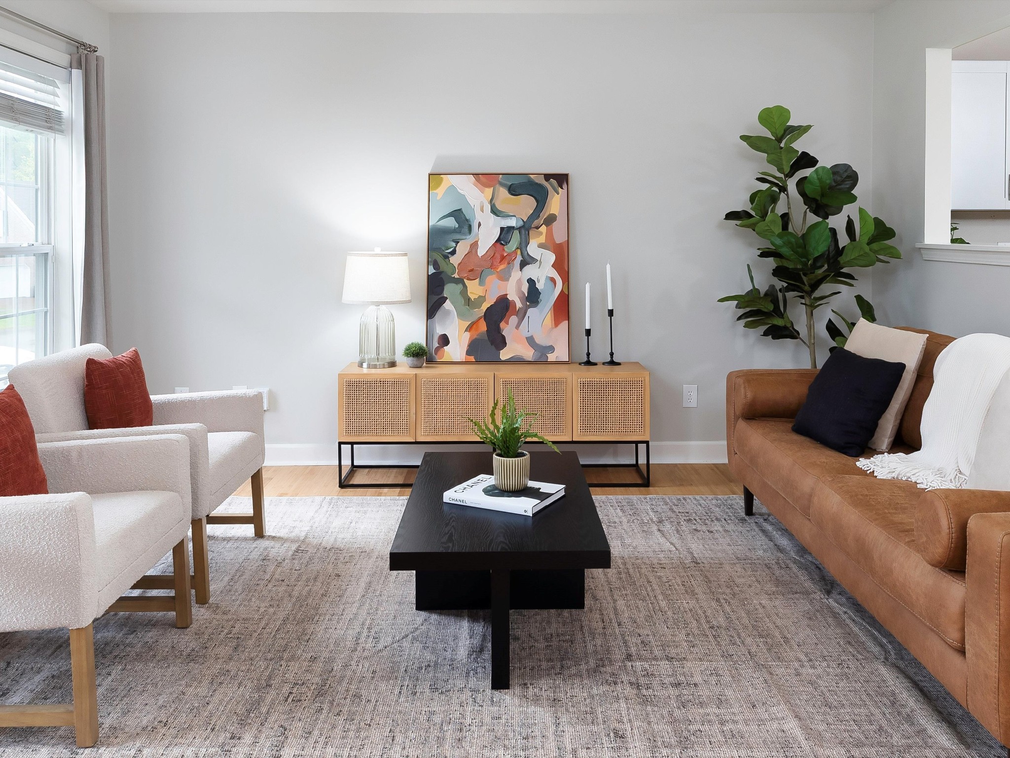 1007 Persimmon Drive Spring Hill, TN 37174 - Photo 9 of 44 a living room with furniture or couch and a potted plant