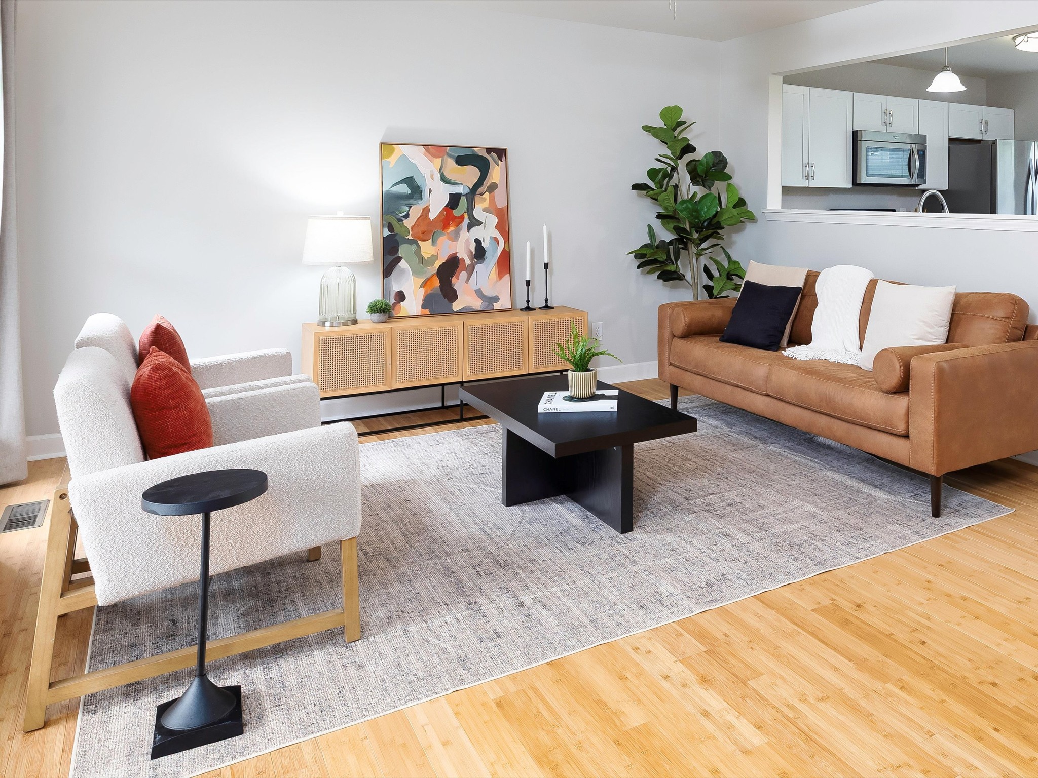 1007 Persimmon Drive Spring Hill, TN 37174 - Photo 10 of 44 a living room with furniture and a potted plant