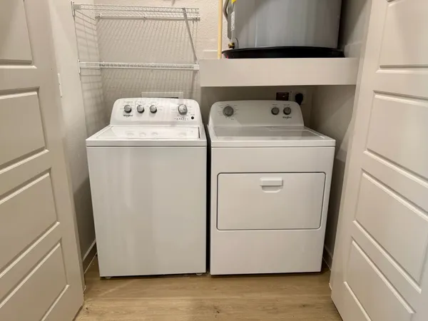 a utility room with dryer and washer