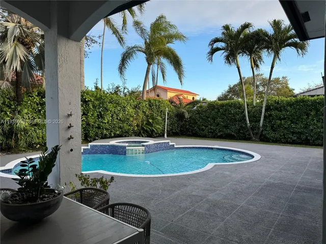 a view of outdoor space yard swimming pool and patio