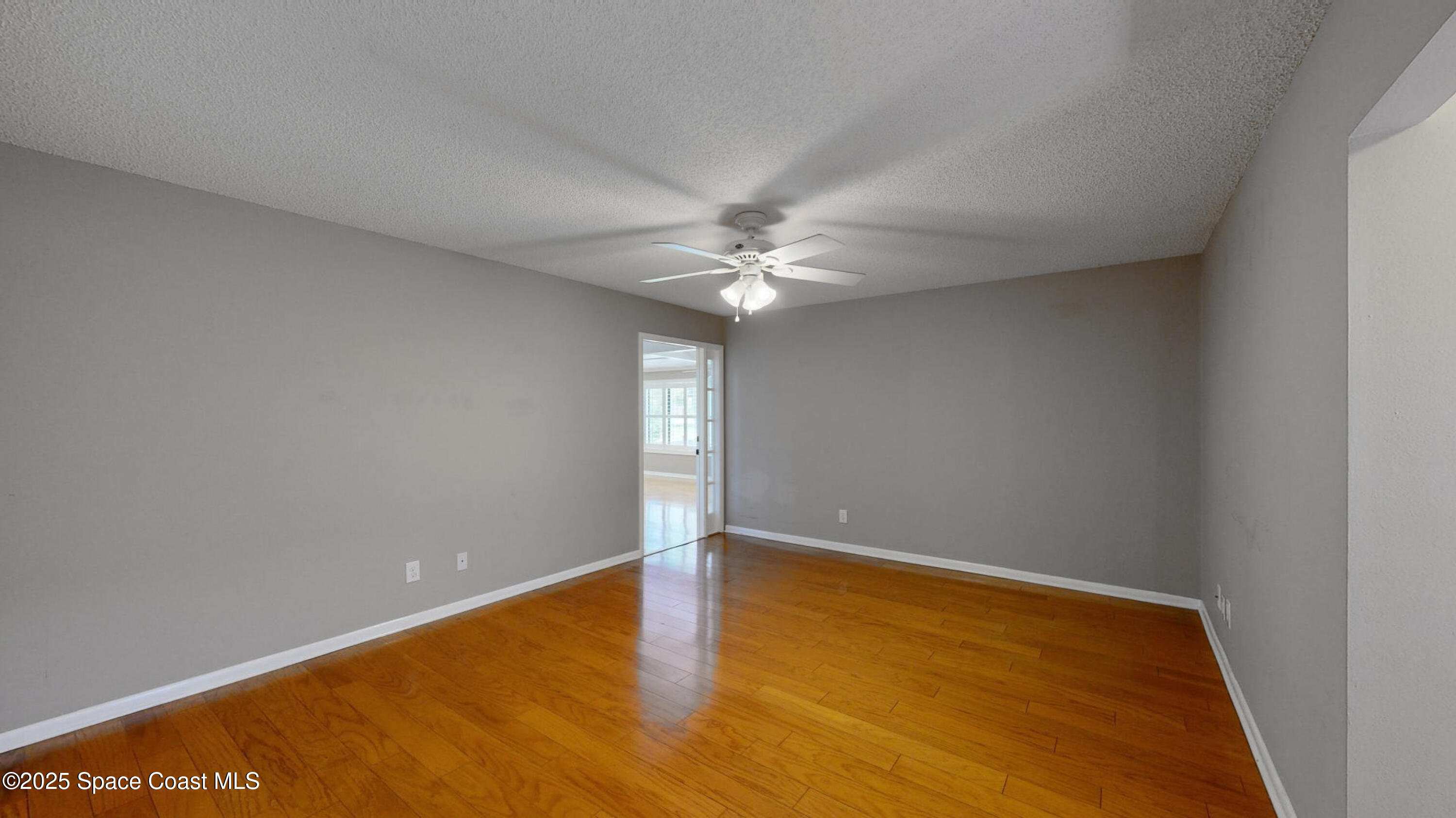 800 Inverness Avenue Melbourne, FL 32940 - Photo 18 of 22 a view of an empty room with a window