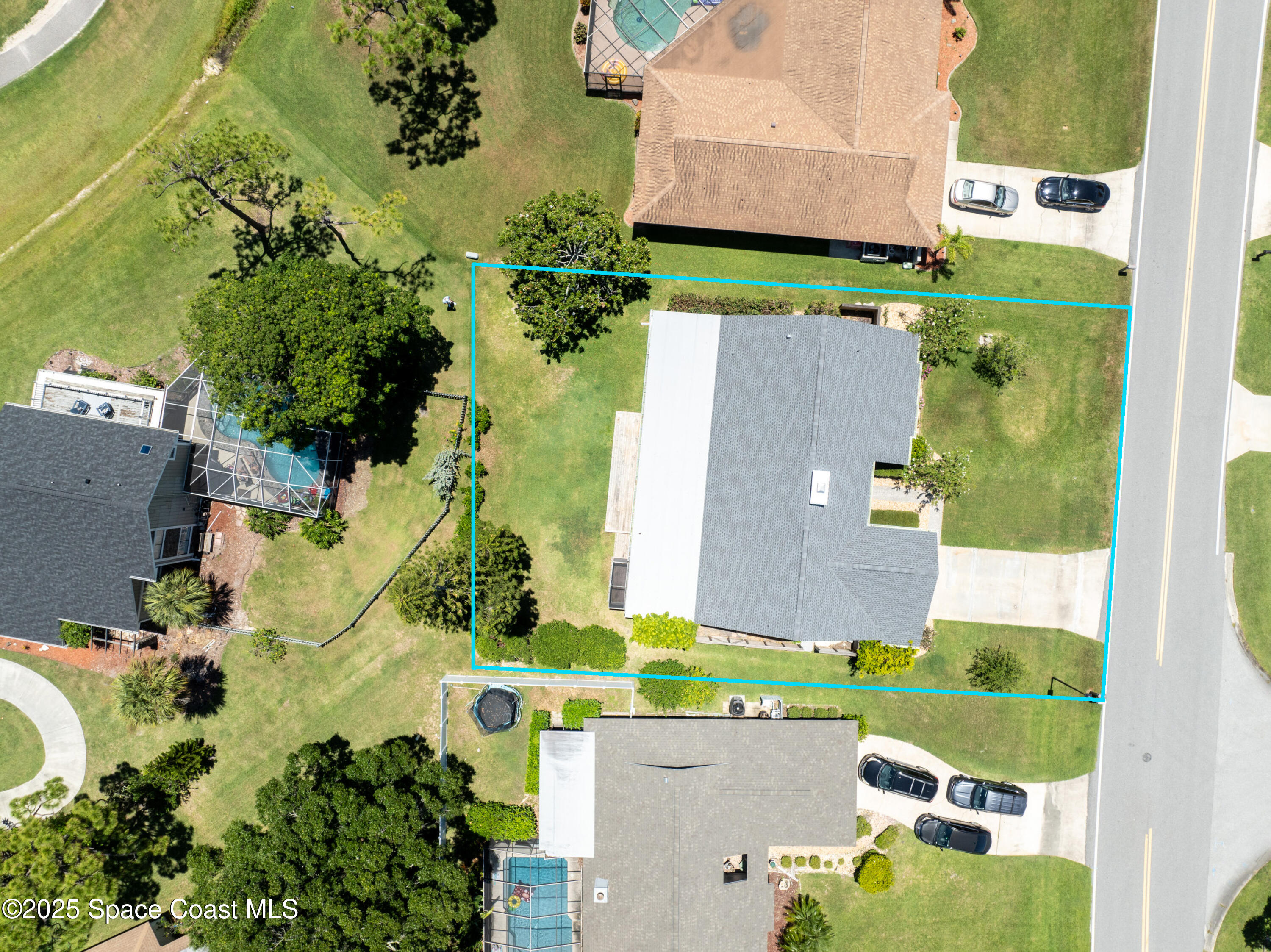 800 Inverness Avenue Melbourne, FL 32940 - Photo 3 of 22 an aerial view of a house with a swimming pool