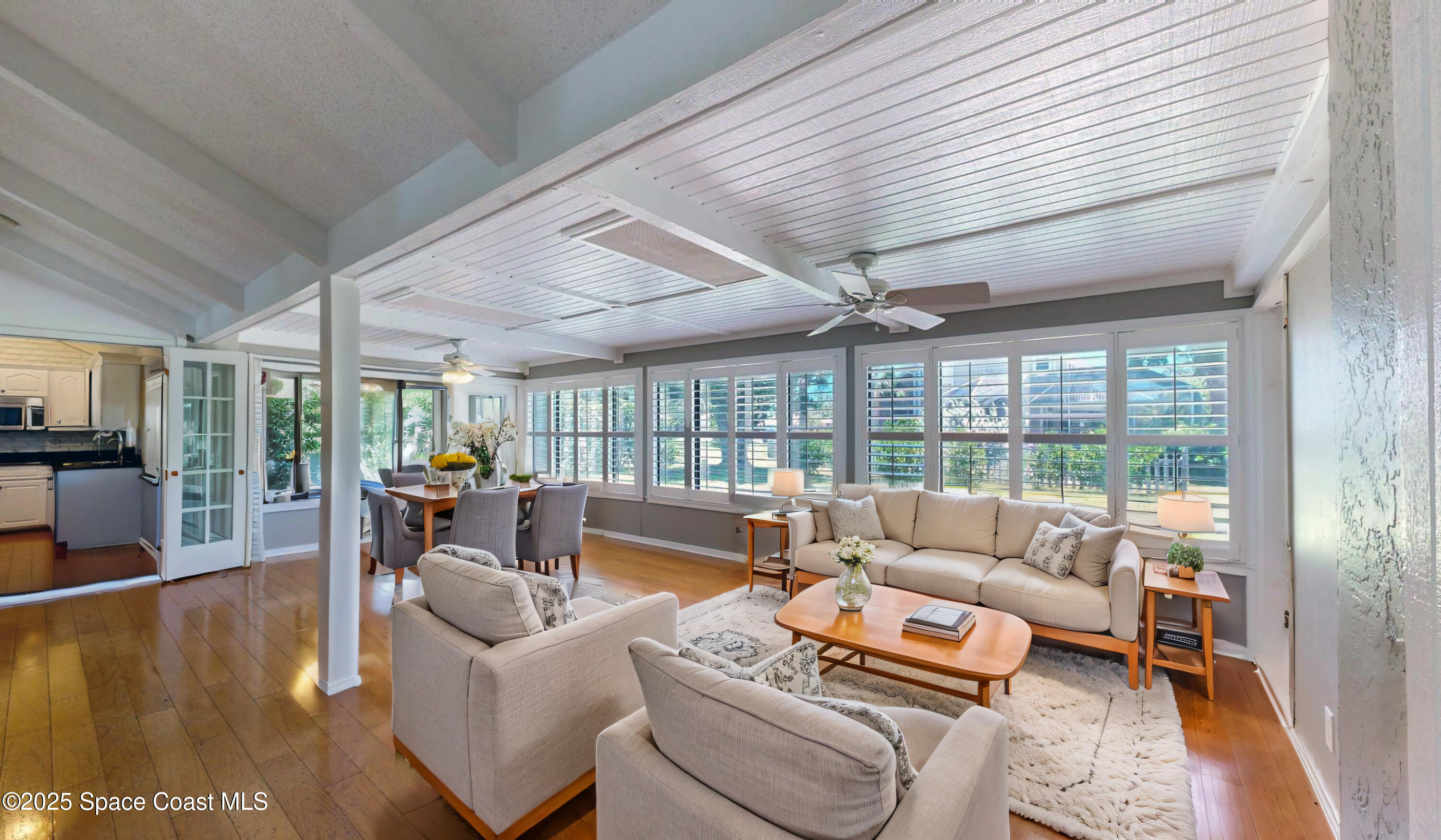 800 Inverness Avenue Melbourne, FL 32940 - Photo 8 of 22 a living room with furniture and a large window