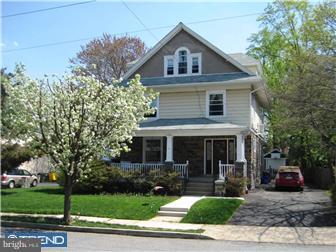 9 Chelten Road Havertown, PA 19083 - Photo 1 of 12 a front view of a house with a yard