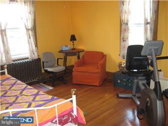 9 Chelten Road Havertown, PA 19083 - Photo 11 of 12 a living room with furniture and a window