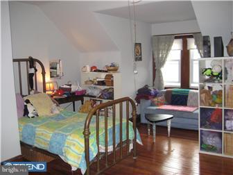 9 Chelten Road Havertown, PA 19083 - Photo 12 of 12 a living room with furniture and a wooden floor