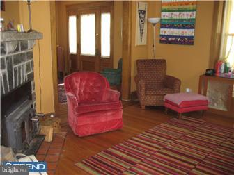 9 Chelten Road Havertown, PA 19083 - Photo 6 of 12 a living room with furniture and a fireplace