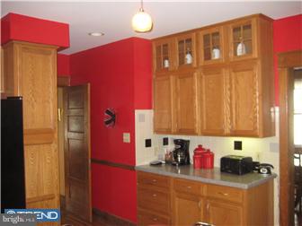 9 Chelten Road Havertown, PA 19083 - Photo 9 of 12 a kitchen with a refrigerator and a stove