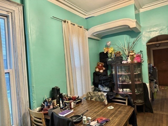495 Warren Street Boston, MA 02121 - Photo 15 of 25 a living room filled with furniture and a fireplace