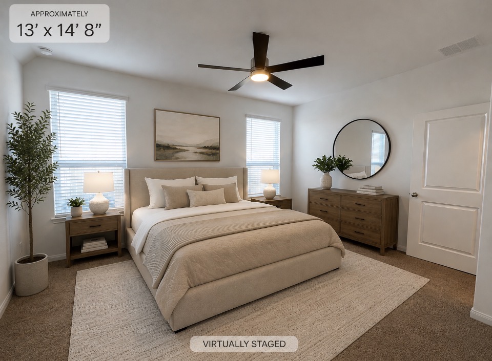 8534 Wellspring Loop Round Rock, TX 78665 - Photo 7 of 32 A quiet and comfortable primary bedroom on the main level with neutral decor and ample natural light.