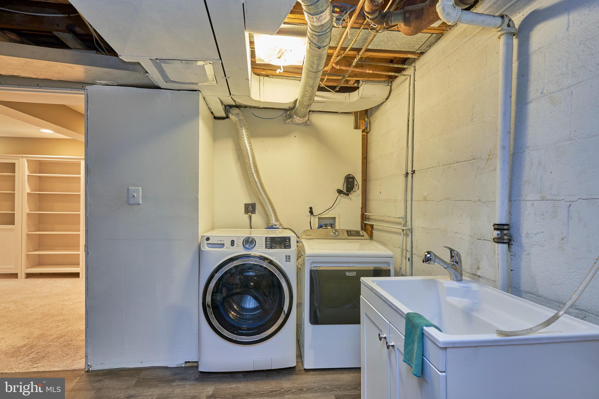 6819 Lemon Road McLean, VA 22101 - Photo 38 of 51 Laundry room with sink and so much storage space