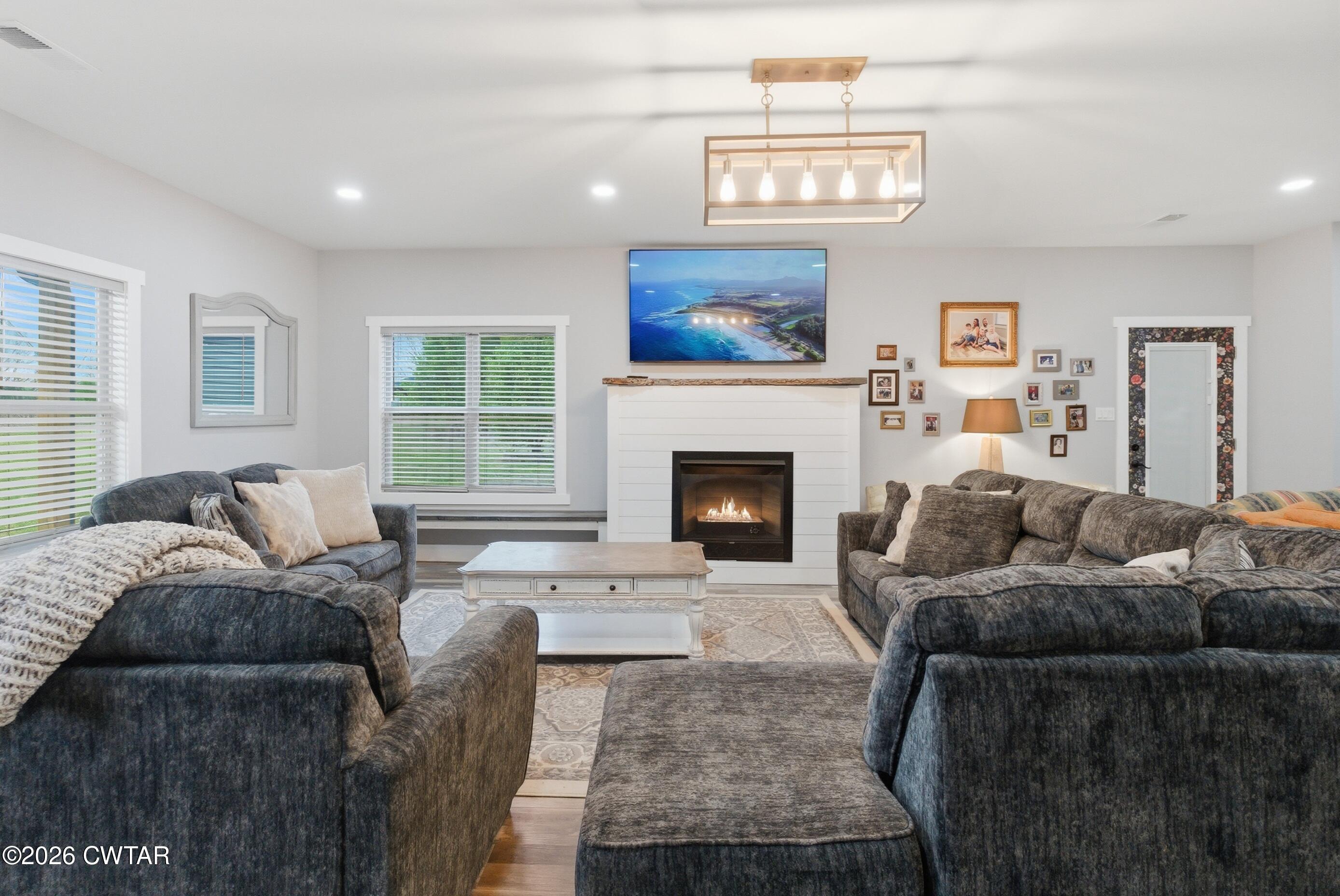 1586 Love Road Bells, TN 38006 - Photo 15 of 61 a living room with furniture and a fireplace