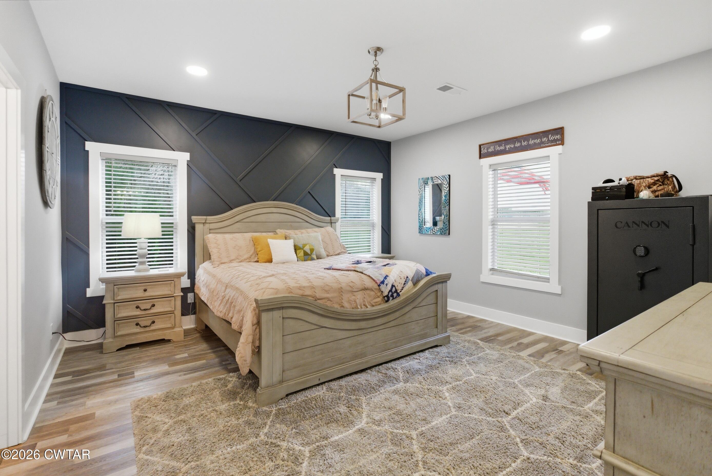1586 Love Road Bells, TN 38006 - Photo 18 of 61 a bedroom with a large bed and a window