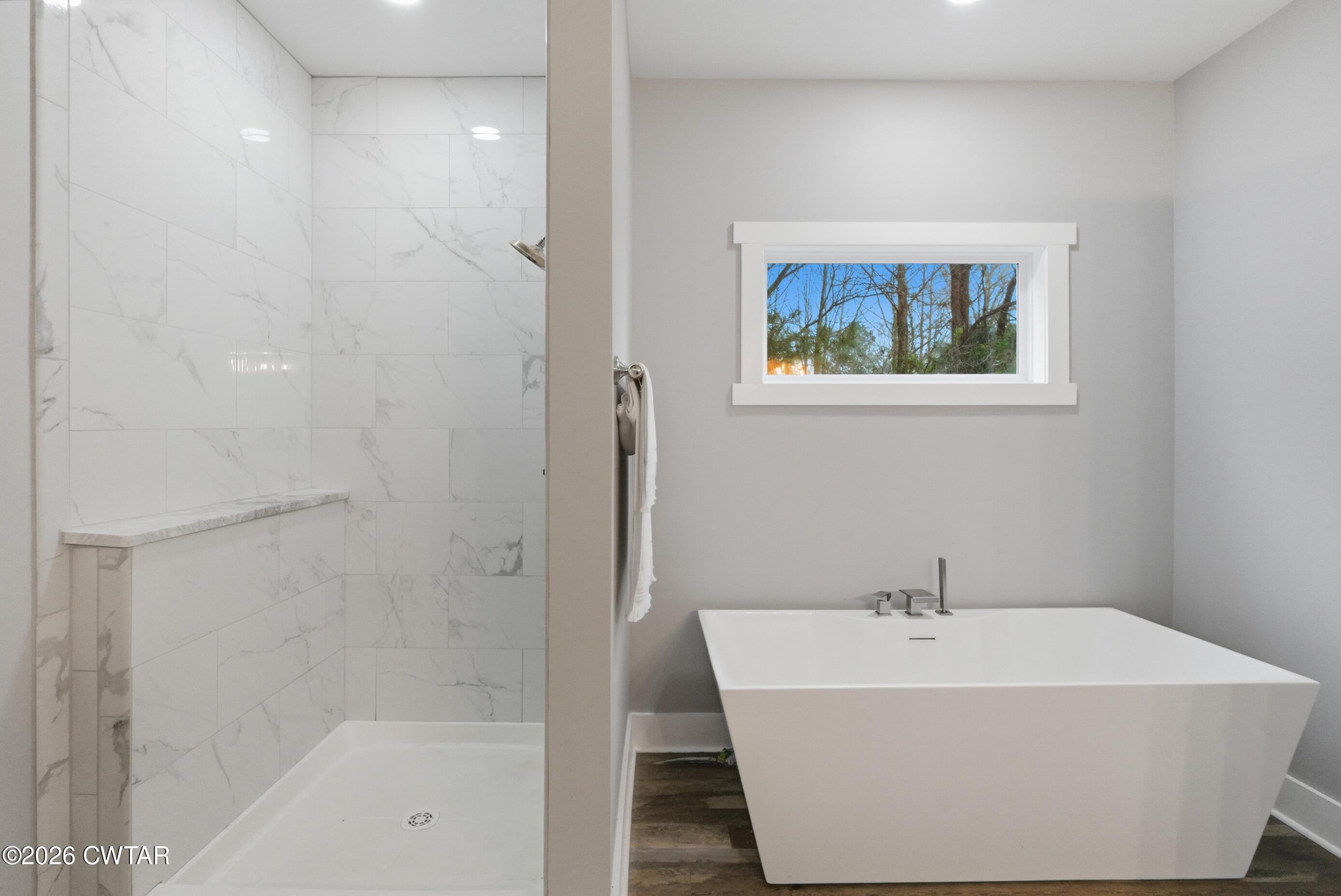 1586 Love Road Bells, TN 38006 - Photo 22 of 61 a white bath tub sitting next to a white sink