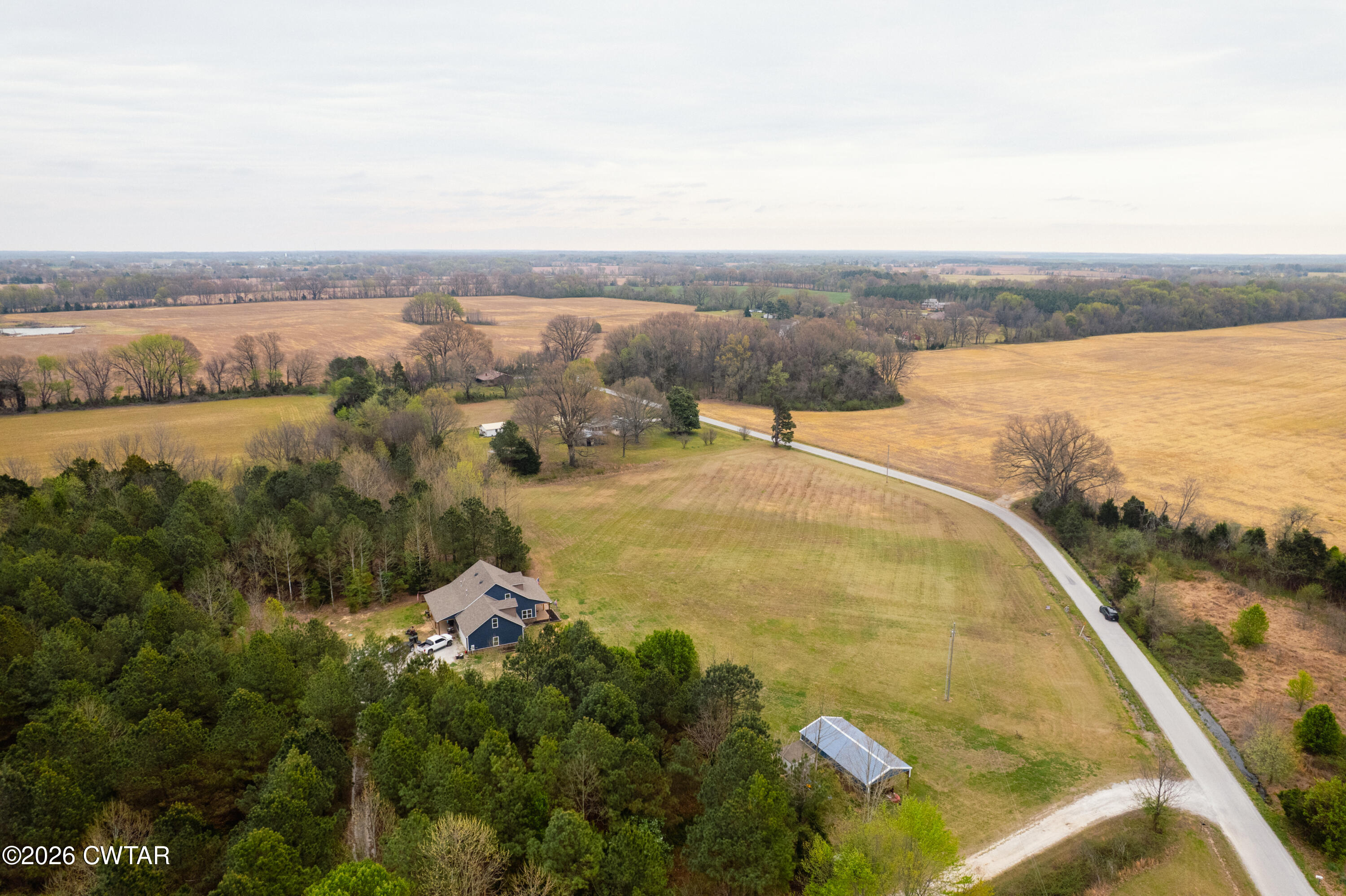 1586 Love Road Bells, TN 38006 - Photo 36 of 61 a view of a lake with a city view