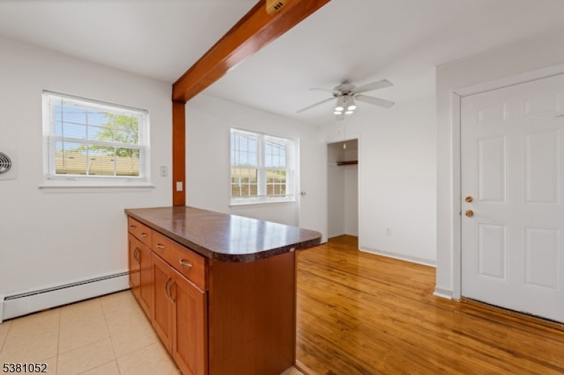 1285 Valley Road Wayne, NJ 07470 - Photo 11 of 33 wooden floor in an empty room with a window