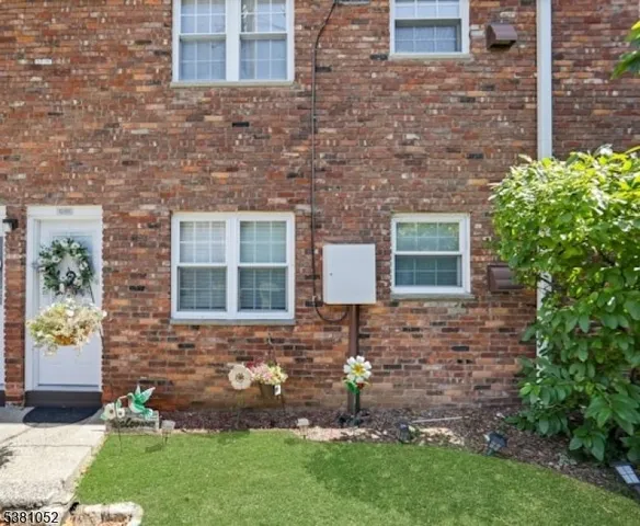 a view of a livingroom with chairs