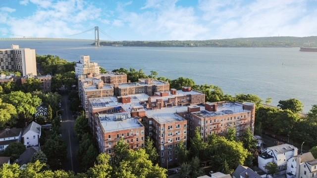 8701 Shore Road, Unit 421 Brooklyn, NY 11209 - Photo 18 of 20 a picture of city view with lake view and mountain view