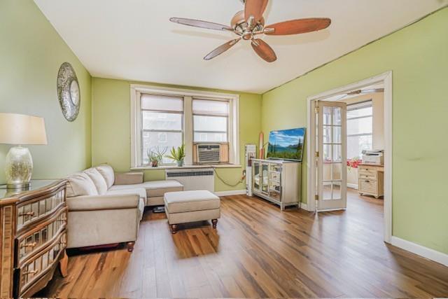 8701 Shore Road, Unit 421 Brooklyn, NY 11209 - Photo 2 of 20 a living room with furniture and a large window