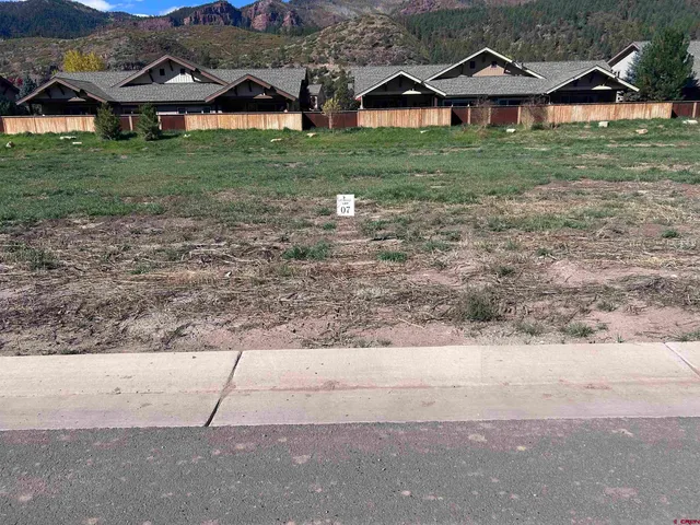 a bathroom with a mirror and a shower curtain