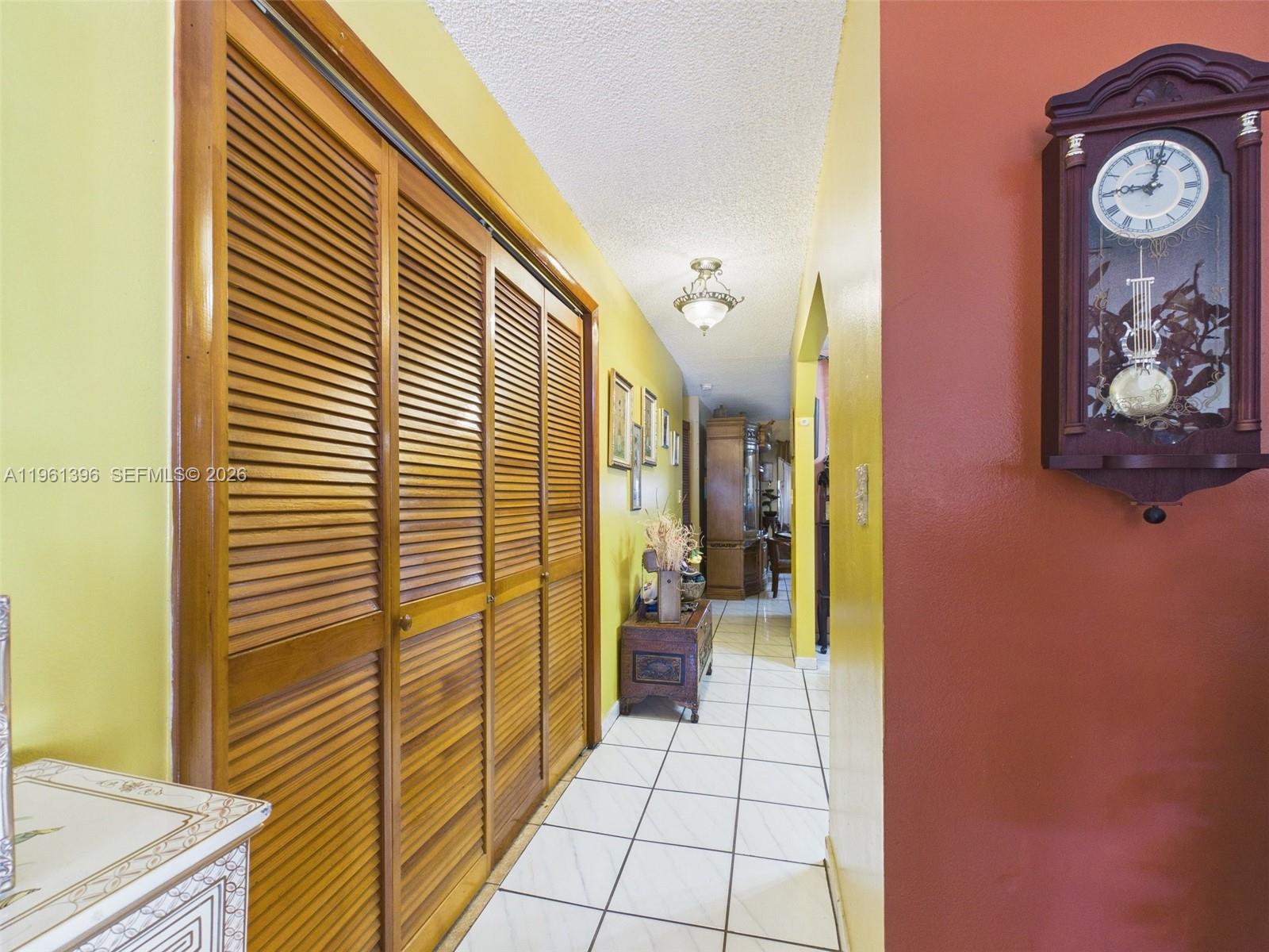 46 Northwest 24th Court Miami, FL 33125 - Photo 7 of 19 a view of hallway with livingroom
