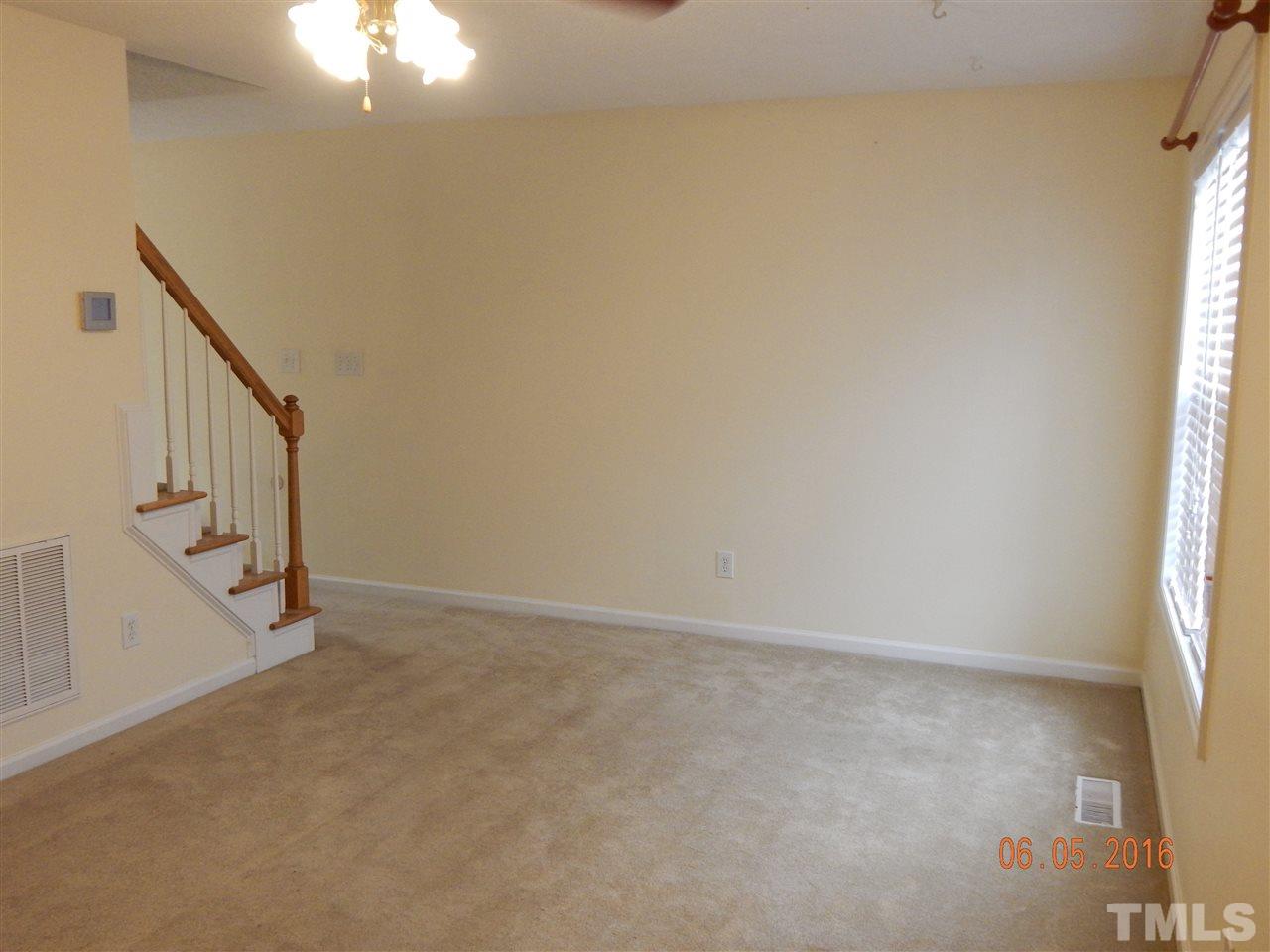 4708 Windbreak Lane Raleigh, NC 27616 - Photo 3 of 13 a view of an empty room with a window