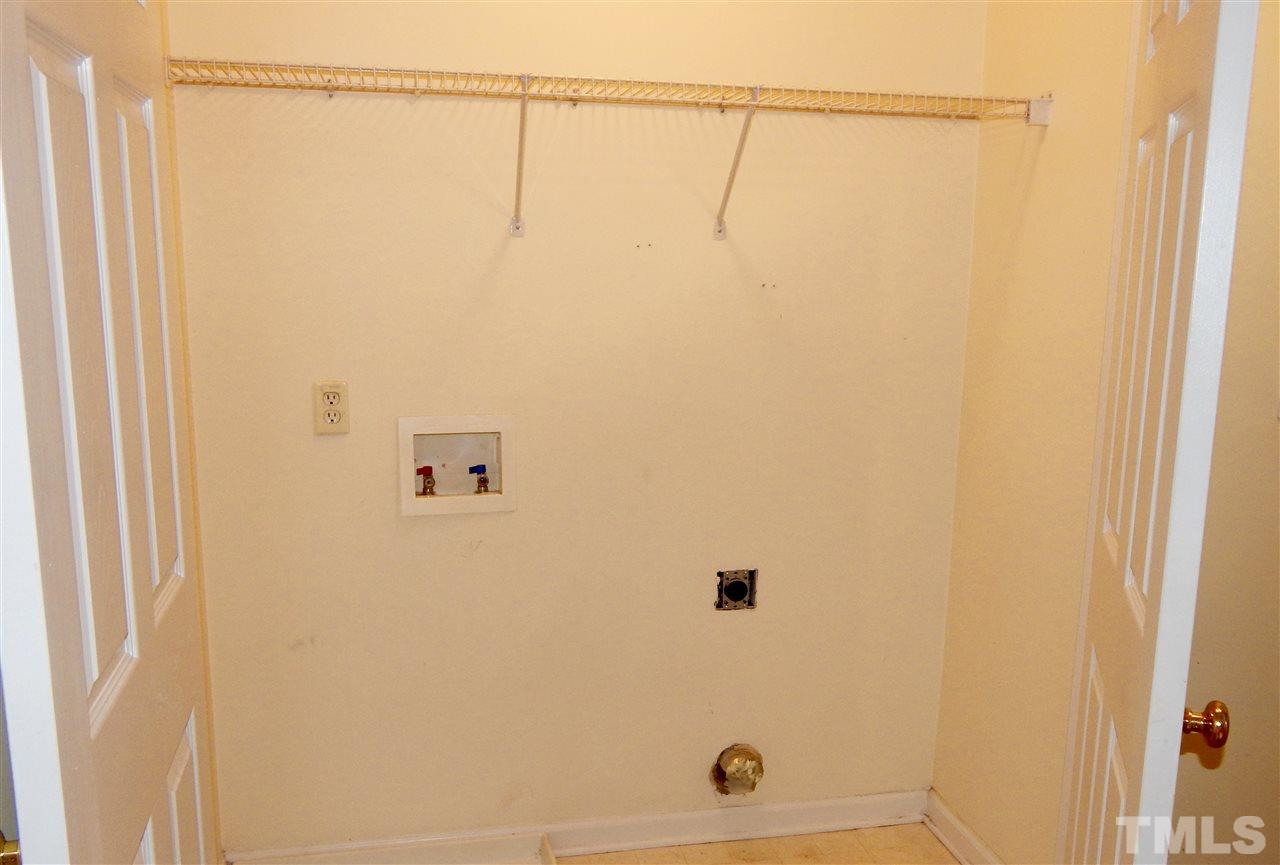 4708 Windbreak Lane Raleigh, NC 27616 - Photo 6 of 13 a bathroom with a shower