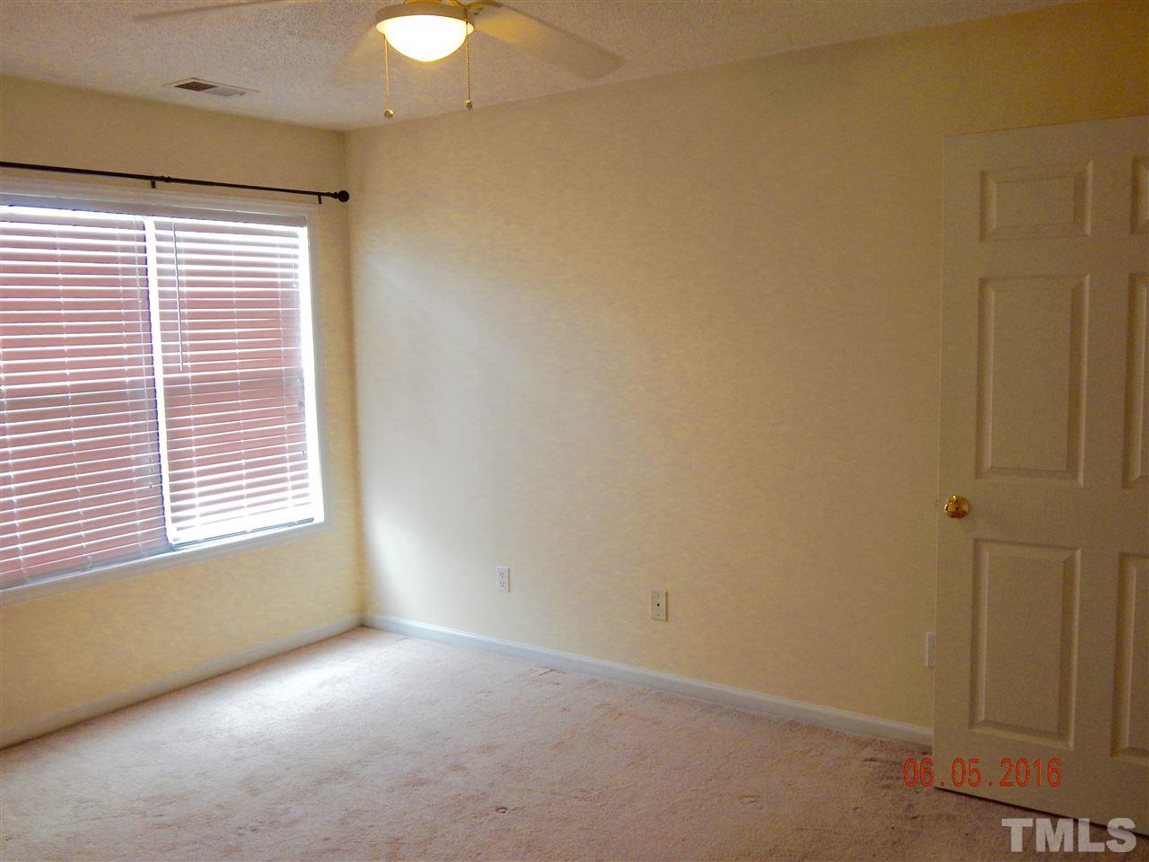 4708 Windbreak Lane Raleigh, NC 27616 - Photo 7 of 13 a view of an empty room with a window