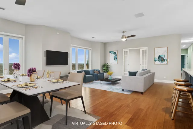a living room with fireplace furniture and a flat screen tv