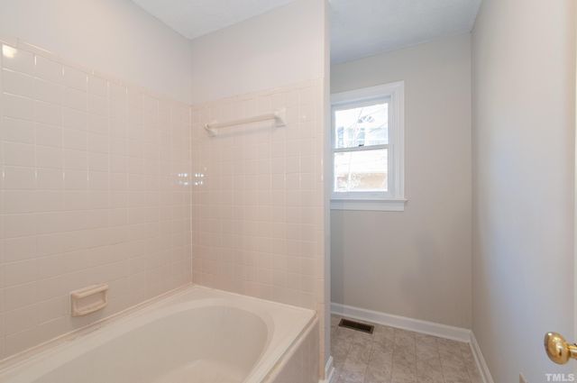 a bathroom with a bathtub