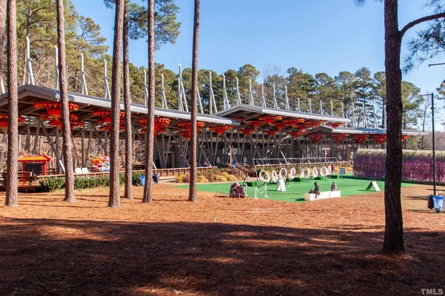 a view of a street with a building in the background