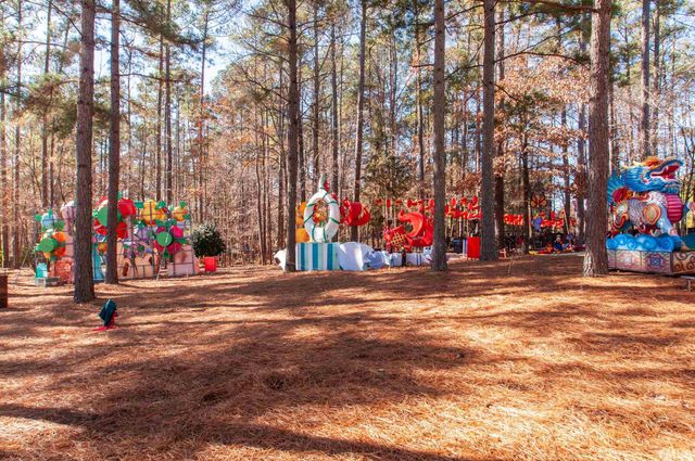 a view of street with cars parked