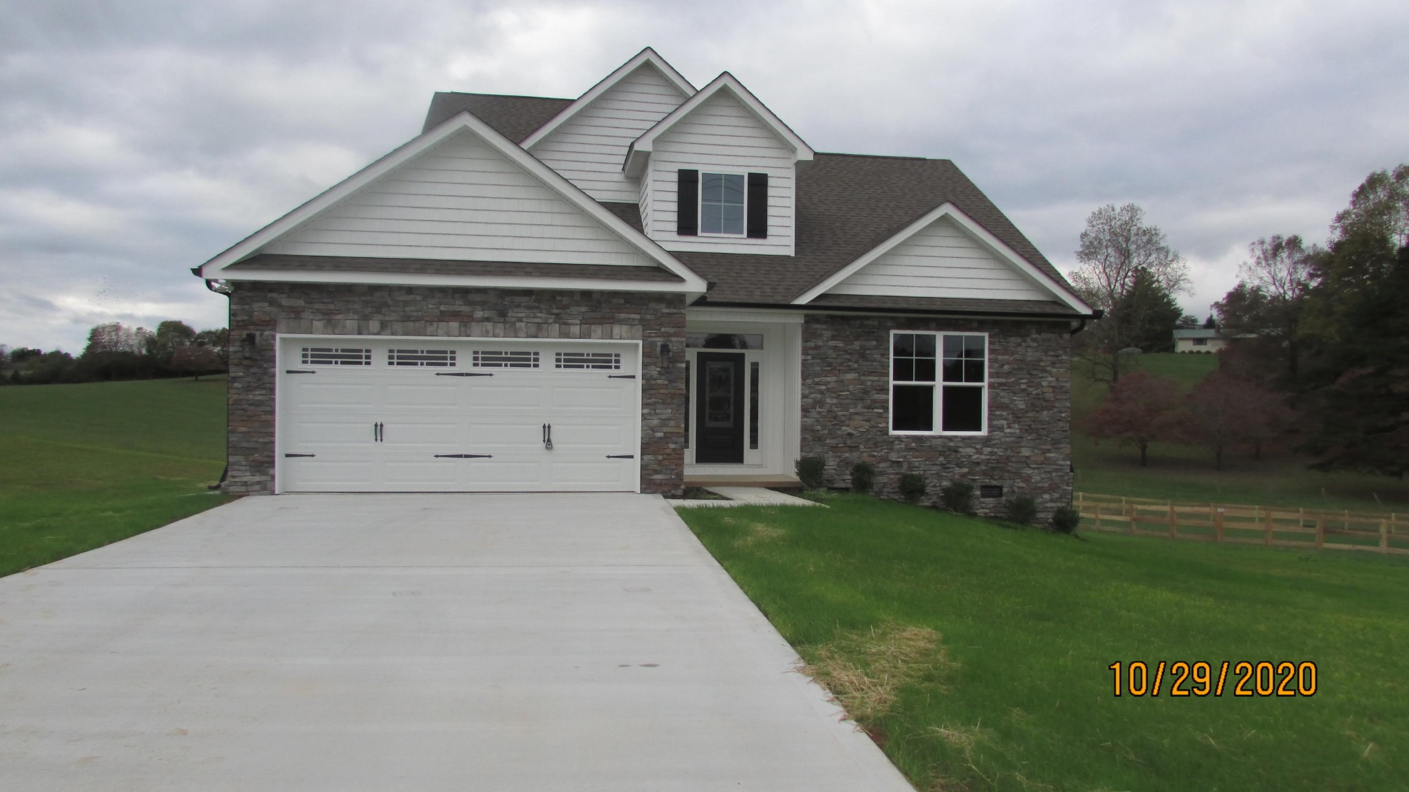 245 South Springview Road Maryville, TN 37801 - Photo 1 of 8 a front view of a house with a yard