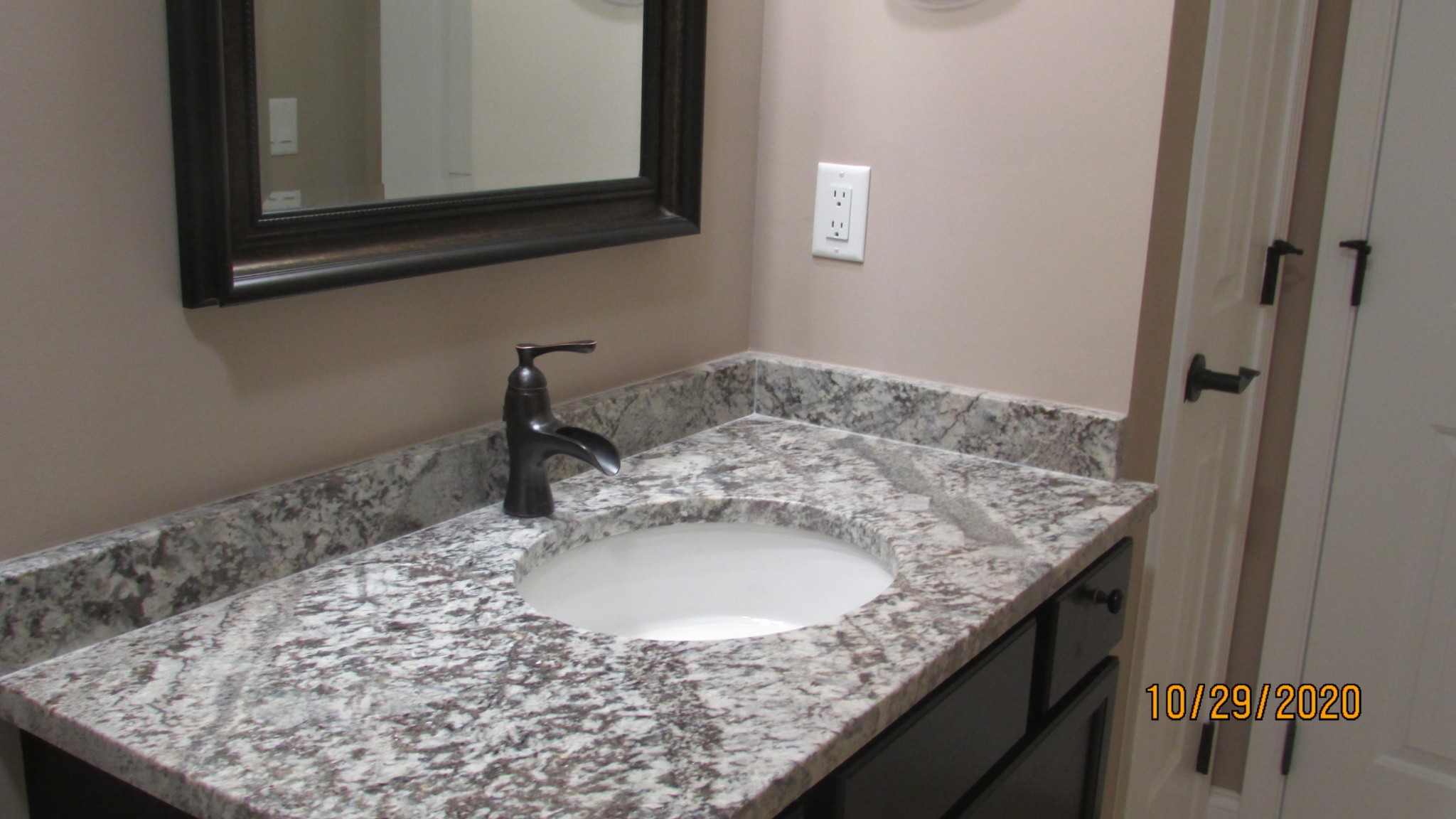 245 South Springview Road Maryville, TN 37801 - Photo 7 of 8 a bathroom with a granite countertop sink and a mirror