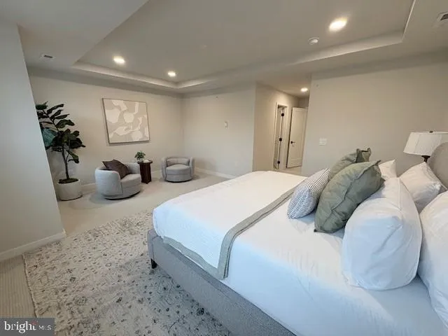 a bedroom with a bed and furniture