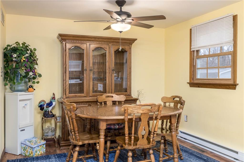 480 Alamae Lakes Road Washington, PA 15301 - Photo 11 of 20 a view of a dining room with furniture and chandelier