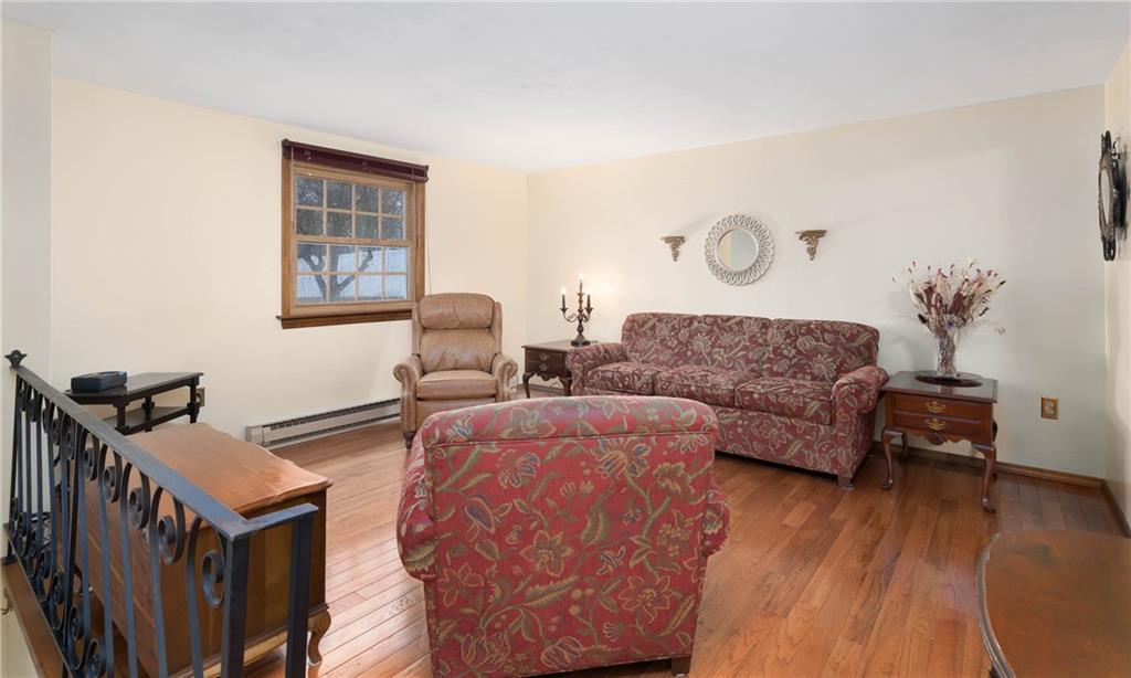 480 Alamae Lakes Road Washington, PA 15301 - Photo 8 of 20 a living room with furniture and wooden floor