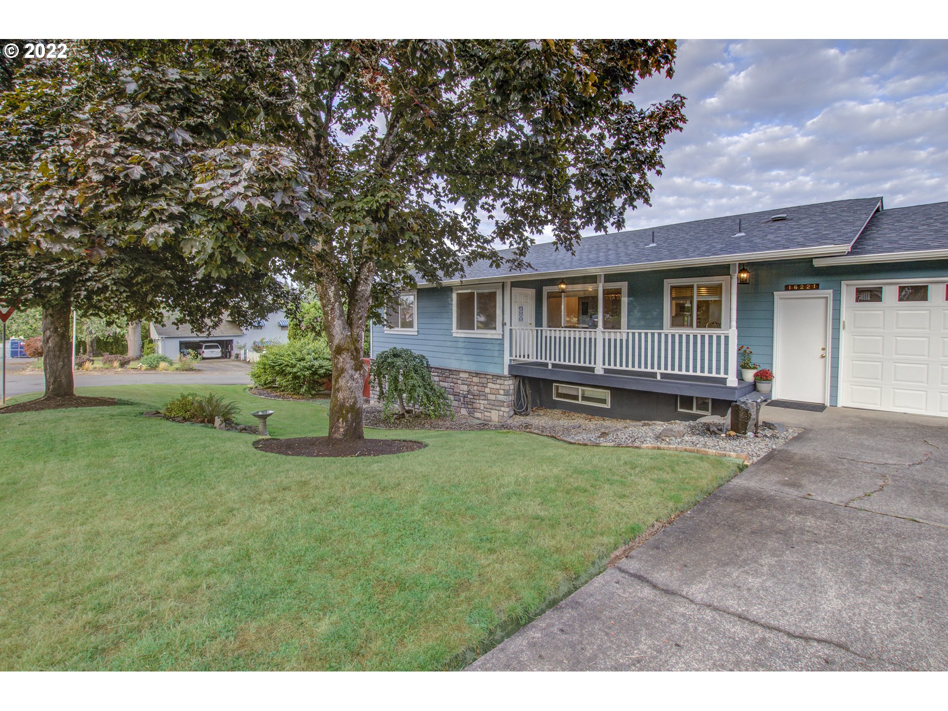16221 Northeast 33rd Avenue Ridgefield, WA 98642 - Photo 2 of 32 a house view with a garden space