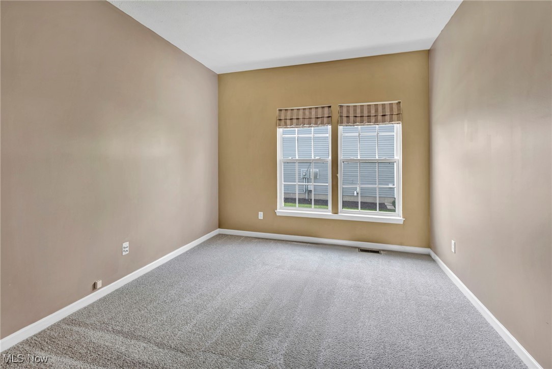 143 Stone Ridge Way Berea, OH 44017 - Photo 6 of 47 Unfurnished room featuring carpet flooring and baseboards