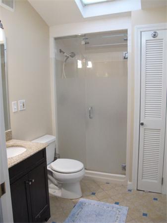 10 Anthony Road Wayland, MA 01778 - Photo 12 of 17 a bathroom with a toilet a sink and shower