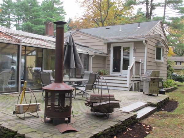 10 Anthony Road Wayland, MA 01778 - Photo 3 of 17 a view of a house with backyard sitting area and garden