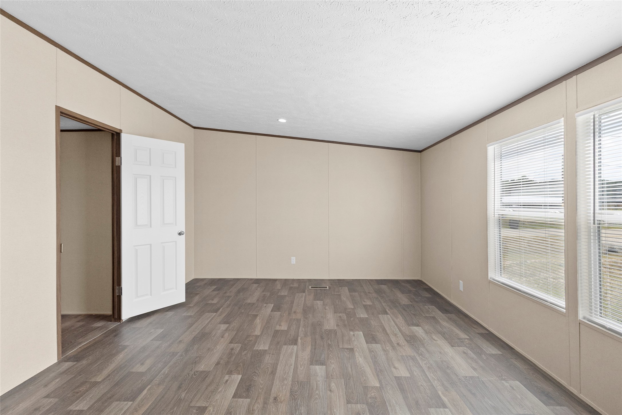 1235 Peter Pne Street Huffman, TX 77336 - Photo 11 of 25 a view of empty room with wooden floor and fan