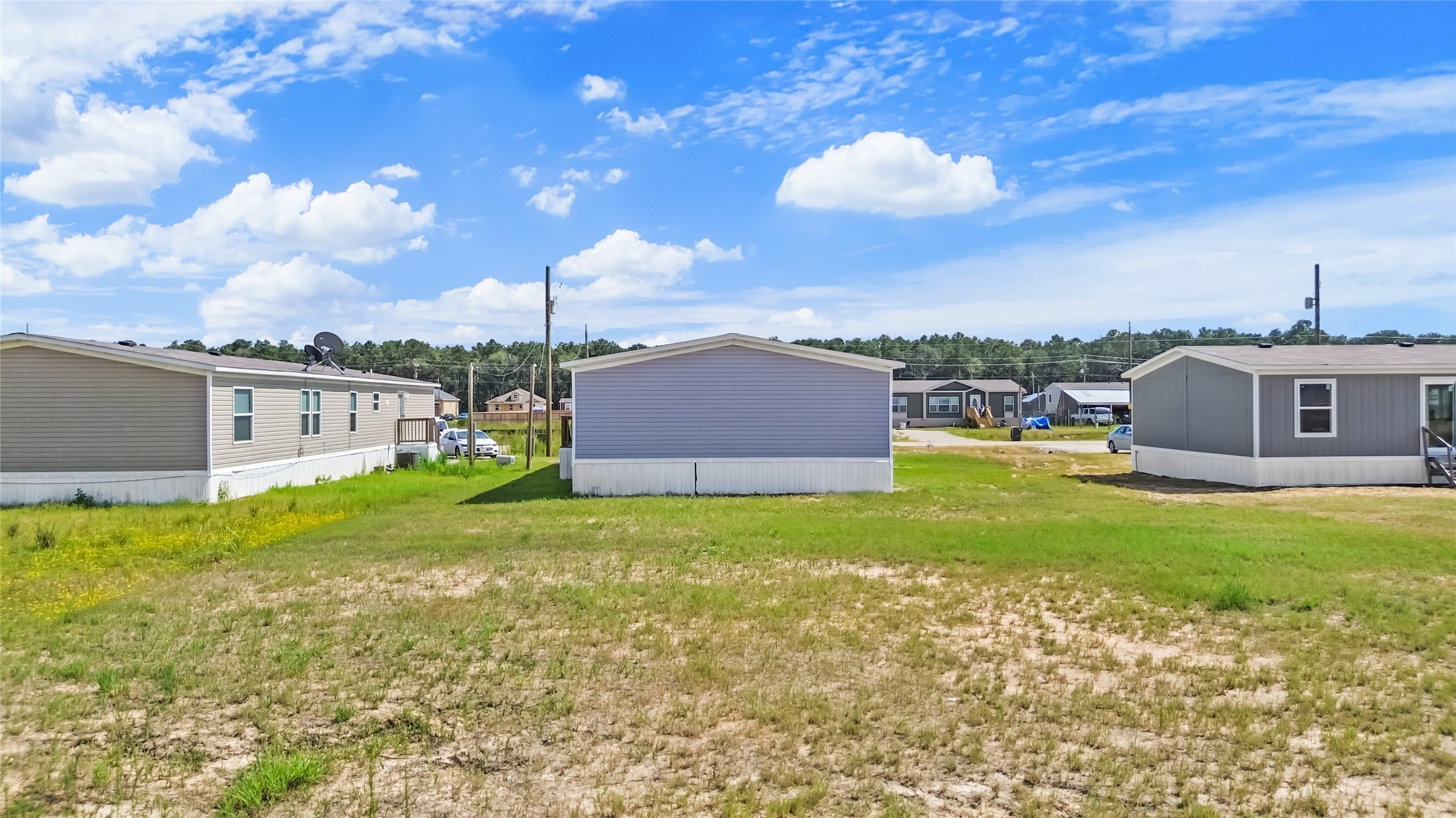 1235 Peter Pne Street Huffman, TX 77336 - Photo 20 of 25 a view of a house with a backyard