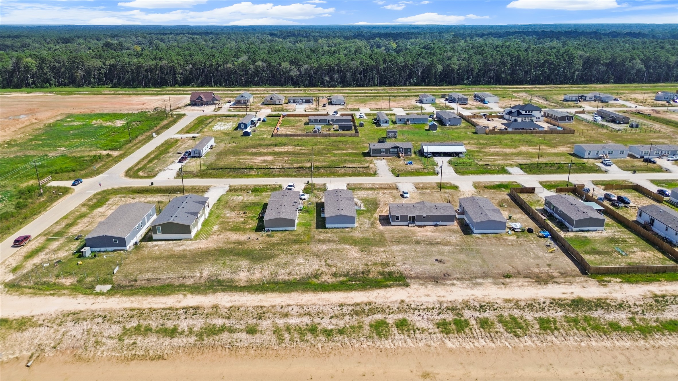 1235 Peter Pne Street Huffman, TX 77336 - Photo 21 of 25 a view of a swimming pool with a lake view