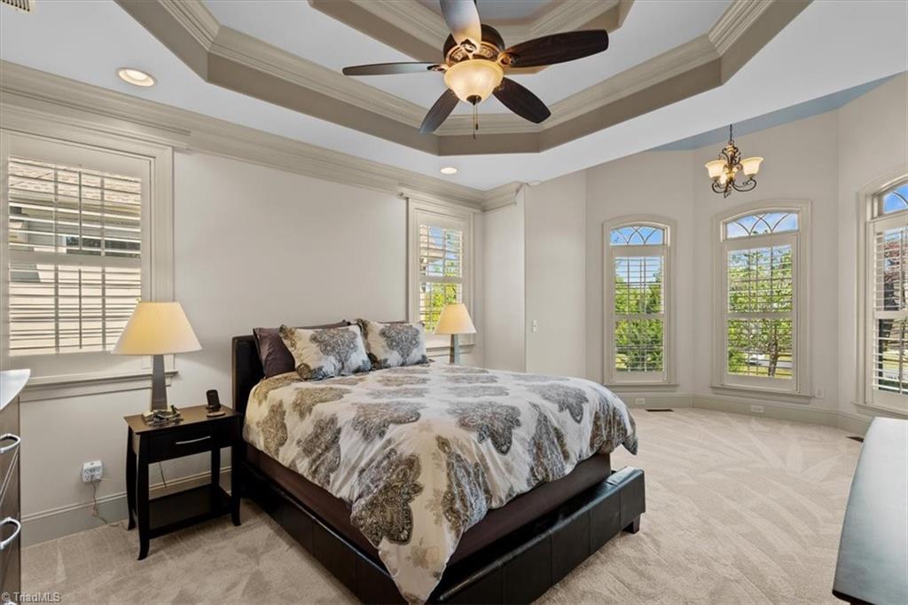 7787 Sutter Road Greensboro, NC 27455 - Photo 21 of 50 Double tray ceiling to round out the gorgeous space.
